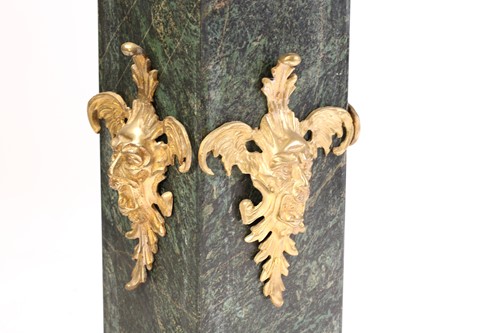 Lot 247 - A pair of gilt bronze and green marble two...