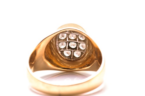 Lot 25 - A signet ring pavé set with diamonds,...