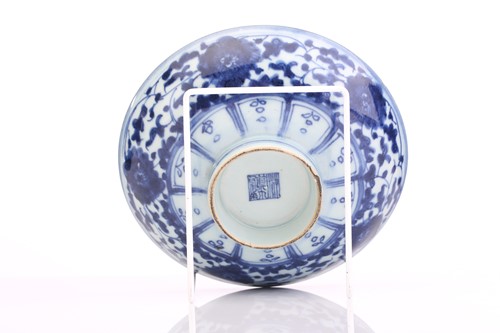 Lot 199 - A Chinese blue & white lotus bowl and dish,...