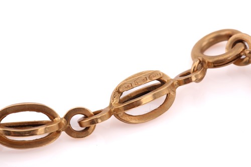 Lot 81 - An 18ct yellow gold oval cage link bracelet,...