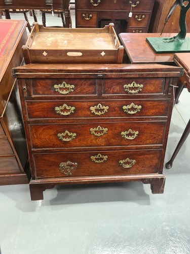Lot 234 - A small George II mahogany bachelor's chest...