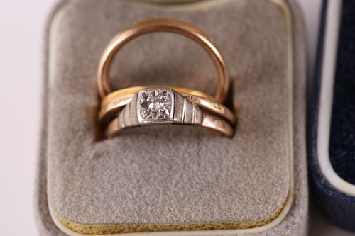 Lot 302 - A 22 carat wedding band together with two 9...