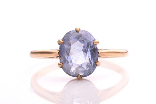 Lot 92 - A sapphire ring, with an oval sapphire in pale...