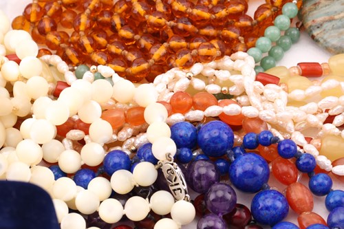 Lot 140 - A collection of mixed beaded necklaces and...