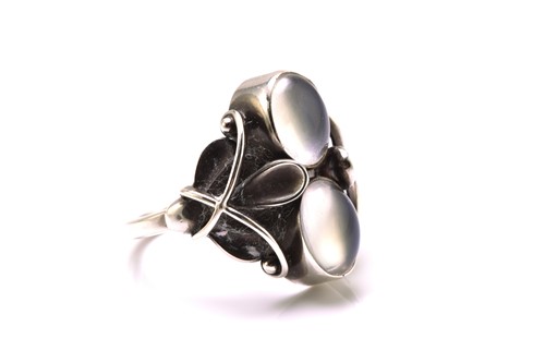 Lot 355 - Georg Jensen - A moonstone ring, comprises two...