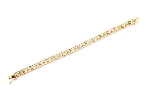 Lot 97 - A bracelet with diamond accents, featuring...
