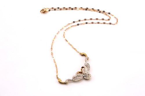 Lot 254 - A diamond necklace in tri-coloured precious...