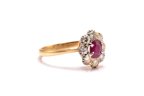 Lot 159 - An 18ct gold and platinum diamond and ruby...