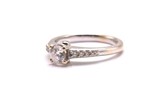 Lot 220 - An 18ct white gold diamond solitaire ring,...
