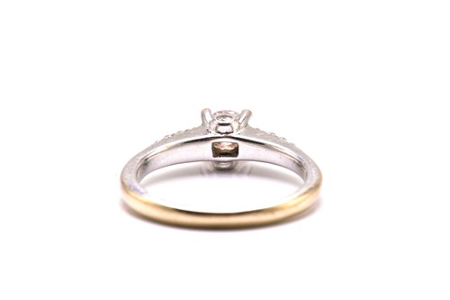 Lot 220 - An 18ct white gold diamond solitaire ring,...