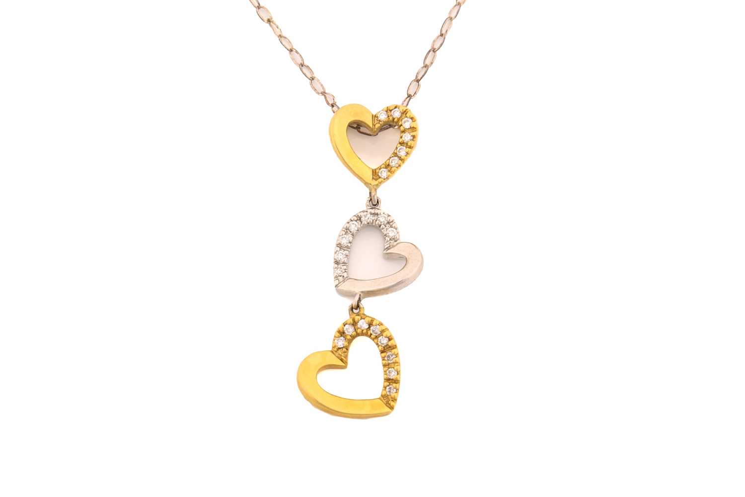 Lot 101 - An 18ct gold and diamond heart necklace,...