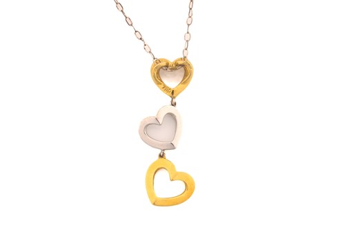 Lot 101 - An 18ct gold and diamond heart necklace,...