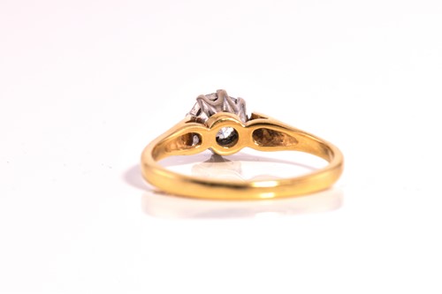 Lot 162 - An 18ct gold solitaire diamond ring, comprises...
