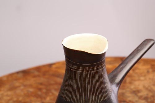 Lot 340 - Lucie Rie (1902-1995), a manganese glaze...