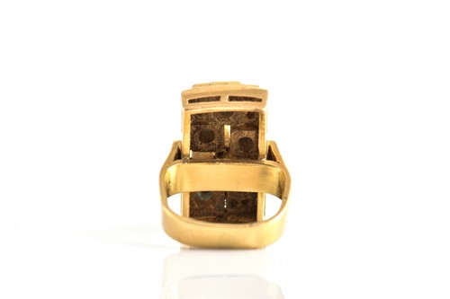 Lot 213 - A modernist sapphire and diamond ring,...