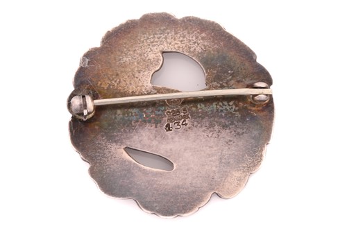 Lot 178 - Georg Jensen - An embossed silver brooch,...