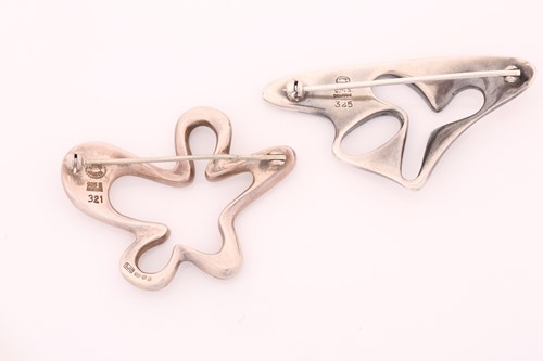 Lot 327 - Georg Jensen - two abstract silver brooches,...