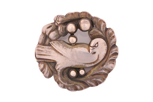 Lot 162 - Georg Jensen - An embossed silver brooch,...