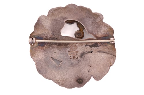 Lot 162 - Georg Jensen - An embossed silver brooch,...