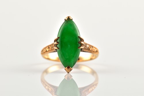 Lot 42 - Two jade rings, one comprises a...