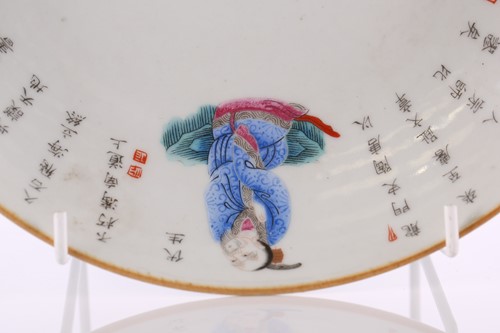 Lot 192 - A Chinese famille rose dish, painted with...