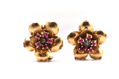 Lot 250 - A pair of swivel flower head earrings, each...