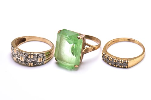 Lot 248 - A lot with three gem-set rings, to include a...