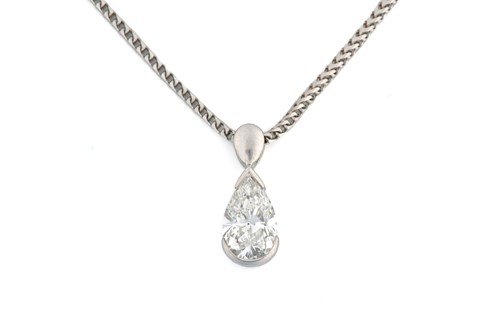 Lot 307 - A pear-shaped diamond pendant on chain, to...