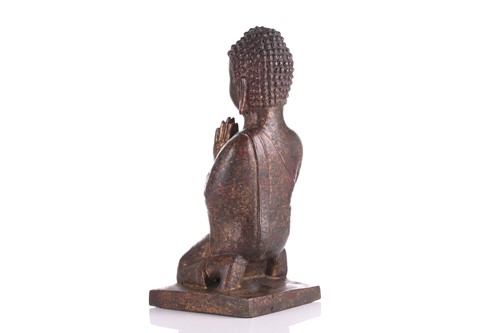 Lot 219 - A Chinese gilt bronze kneeling Buddha, his...