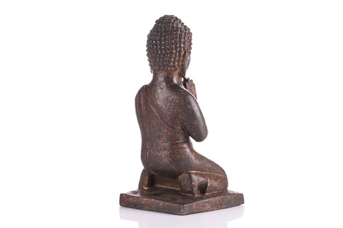 Lot 219 - A Chinese gilt bronze kneeling Buddha, his...