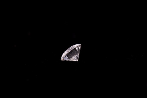 Lot 51 - A loose diamond, the round brilliant-cut white...