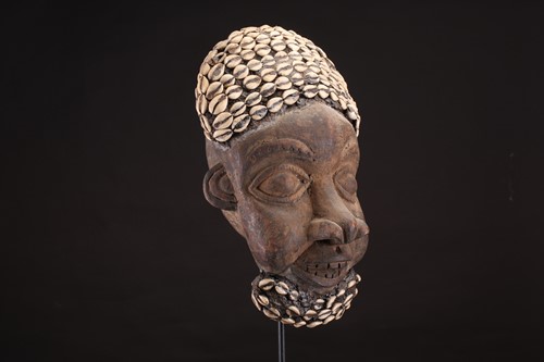 Lot 172 - A Bamileke Kam mask, Cameroon, with a knotted...