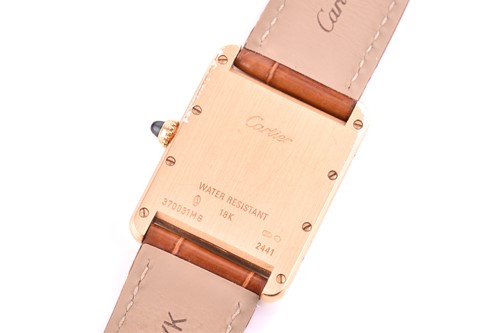 Lot 422 - An 18ct yellow gold Cartier Tank mid-size with...