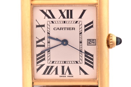 Lot 422 - An 18ct yellow gold Cartier Tank mid-size with...