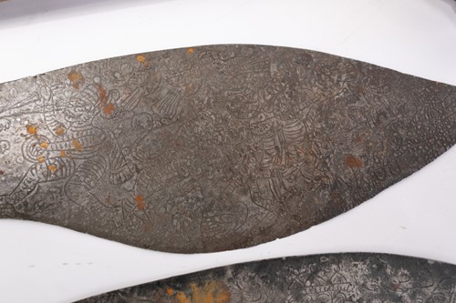 Lot 170 - Two Sepik River stone axes, the stone within a...