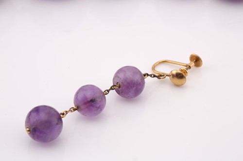 Lot 266 - An amethyst bead necklace and a similar single...