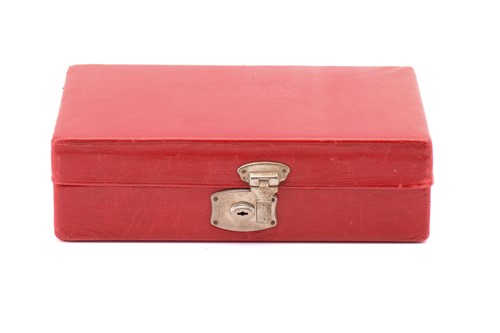 Lot 205 - A red leather jewellery box containing a gilt...