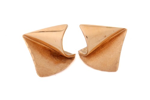 Lot 288 - A pair of fold-formed earrings, each with a...