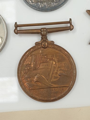 Lot 182 - A WWI medal group to Lt. T B Pugh (R.N.R),...