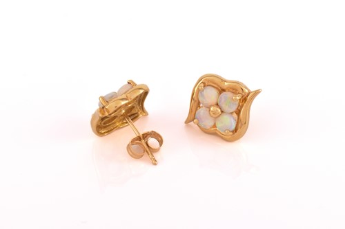 Lot 102 - Three pairs of opal earrings in yellow gold,...