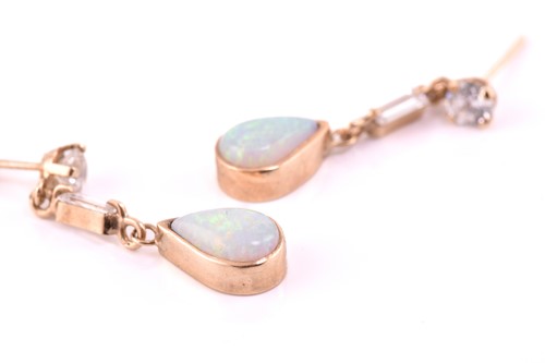 Lot 102 - Three pairs of opal earrings in yellow gold,...