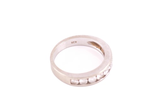 Lot 51 - A diamond half eternity ring, consisting of...