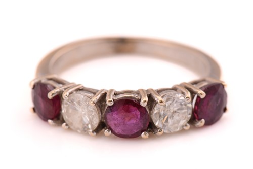 Lot 66 - A ruby and diamond five-stones ring,...