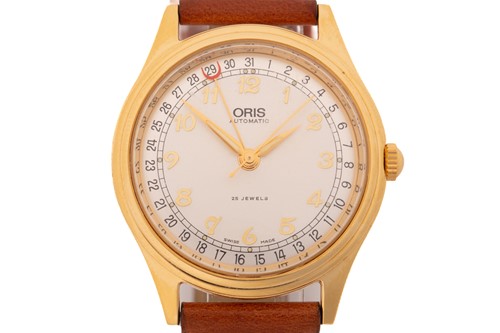 Lot 390 - An Oris pointer date wristwatch, with a...