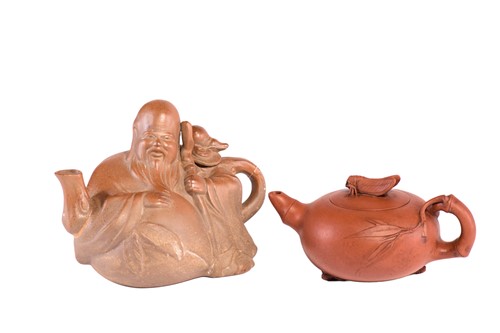 Lot 212 - A Chinese Yixing teapot, 20th century, the...