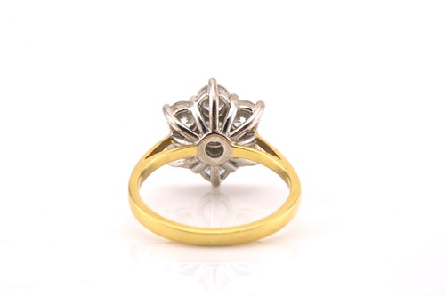 Lot 10 - An 18ct gold diamond cluster ring, comprises...