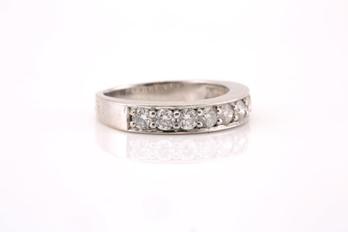 Lot 121 - A diamond half eternity ring in 18ct gold,...