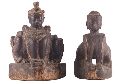 Lot 179 - A set of six carved wood Tibetan praying monks,...