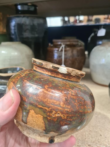 Lot 162 - A large Chinese black glazed soy jar, Qing,...