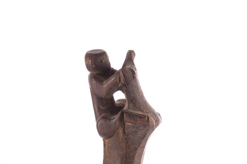 Lot 107 - Ethnographica comprising a hide parrying...